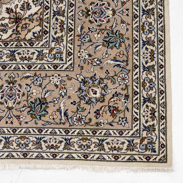 A Keshan carpet, signed, c. 405 x 290 cm.