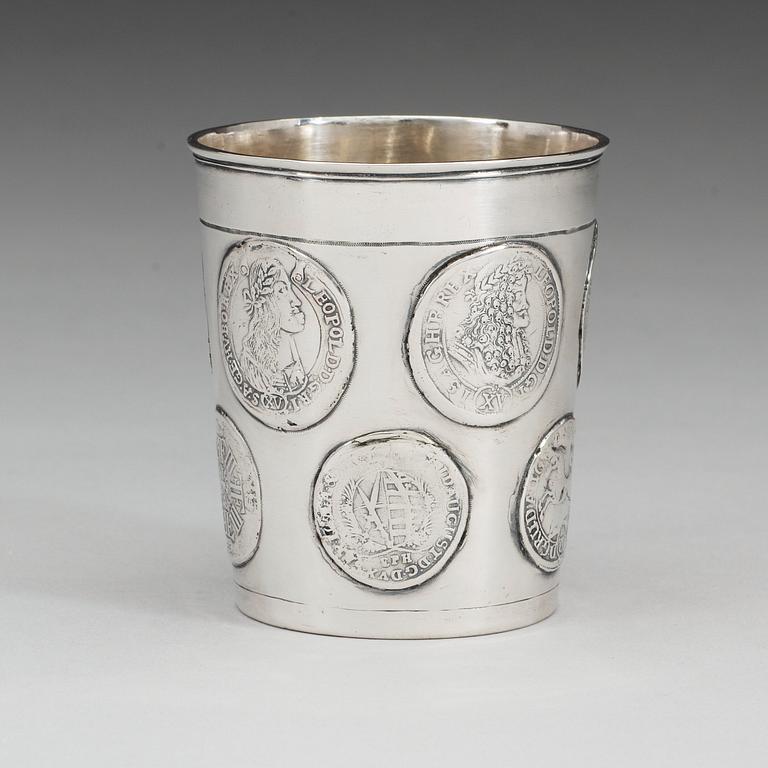 A Austrian-Hungarian early 18th century parcel-gilt beaker, unmarked.