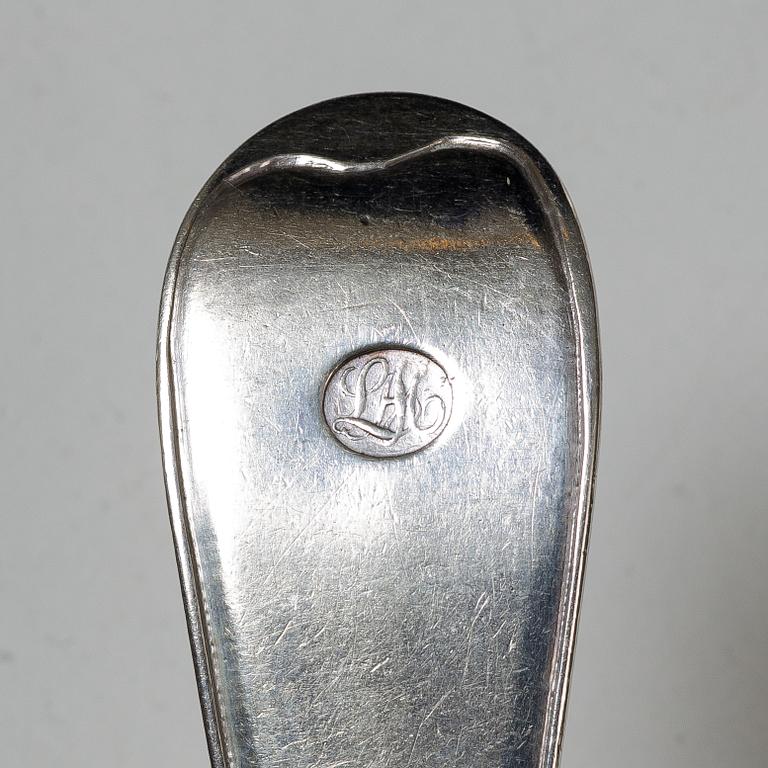 12 pieces of silver cutlery, P Enroth, 1804, and Markströms Guldsmeds Ab K G, 1924.