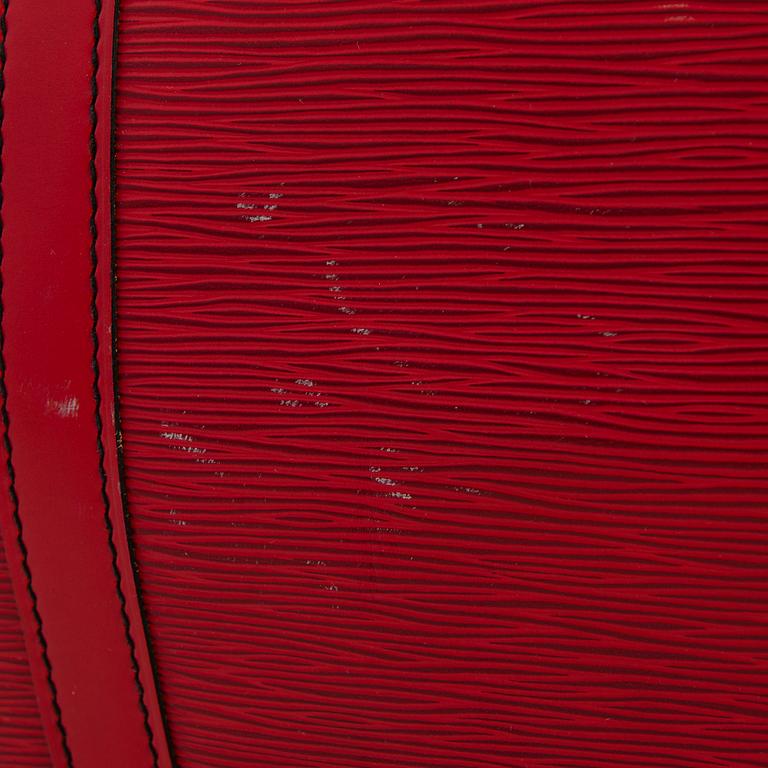 A RED EPI LEATHER KEEPALL TRAVEL BAG.