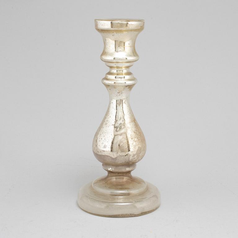 A 19th century glass candlestick.