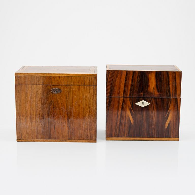 A set of two chests, one with four bottles, 20th Century.