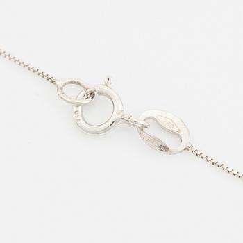 Collier, med fasettslipad oval akvamarin  och briljantslipad diamant.