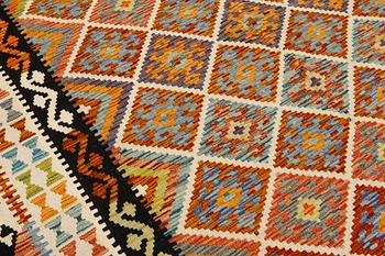 A Kilim carpet, approx. 302 x 203 cm.