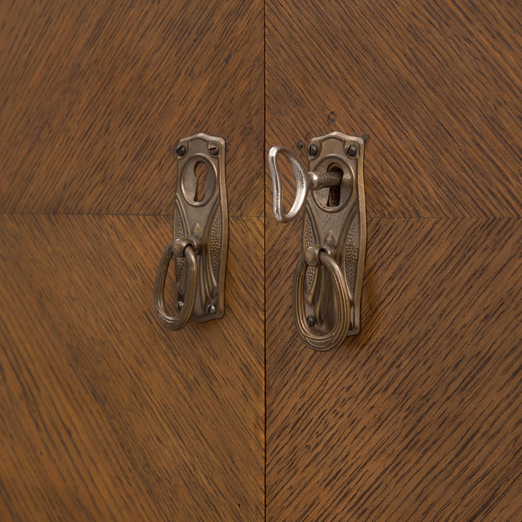 An early 20th century bookcase /  cabinet.