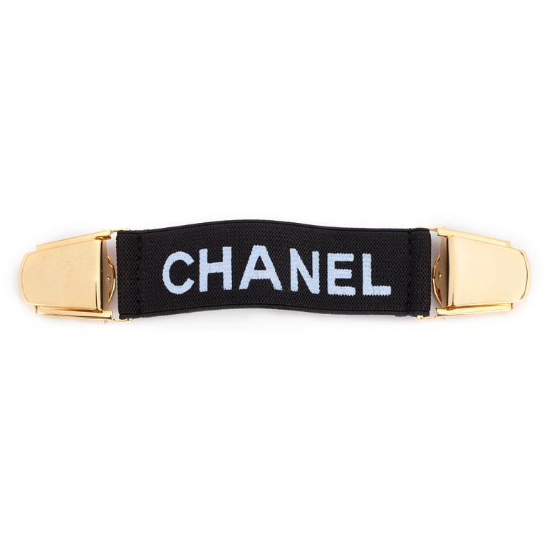 CHANEL, a strap.