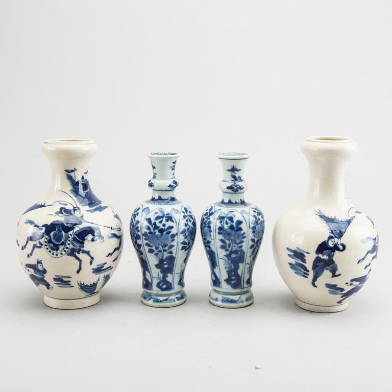 A set of two pairs of Kangxi and Kangxi style blue and white porcelain vases.