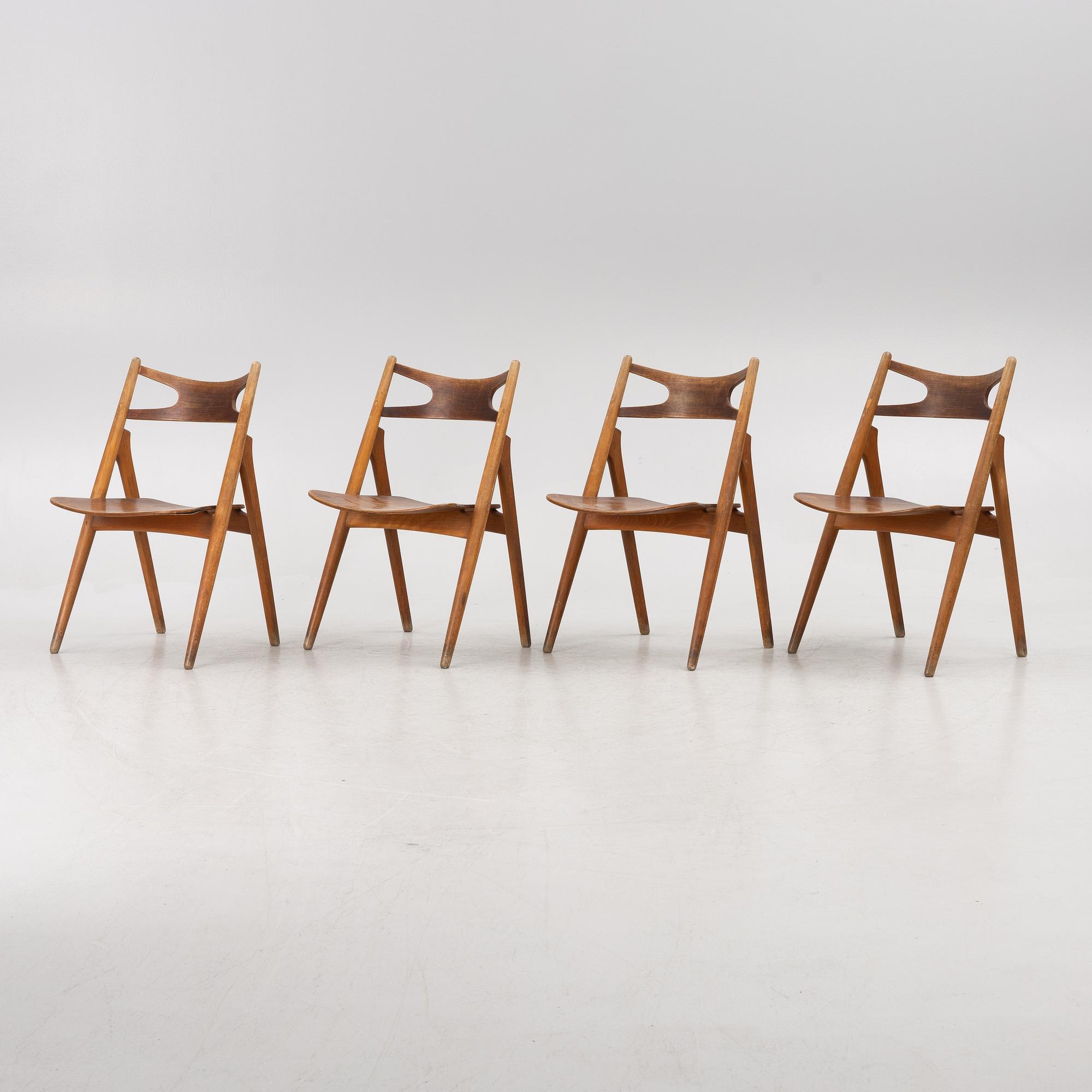 Hans J Wegner, four model CH 29 "The Savbuk Chair", Carl Hansen, 1960s.