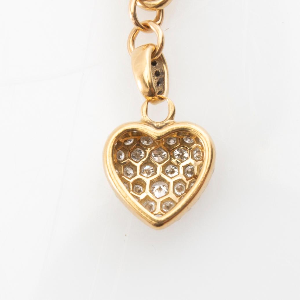 Cartier, Armband av 18K guld med runda briljantslipade diamanter.