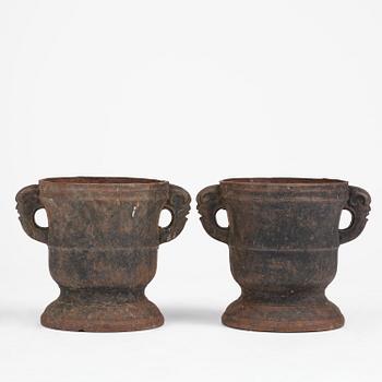 A pair of Swedish cast-iron garden urns, 18th century.