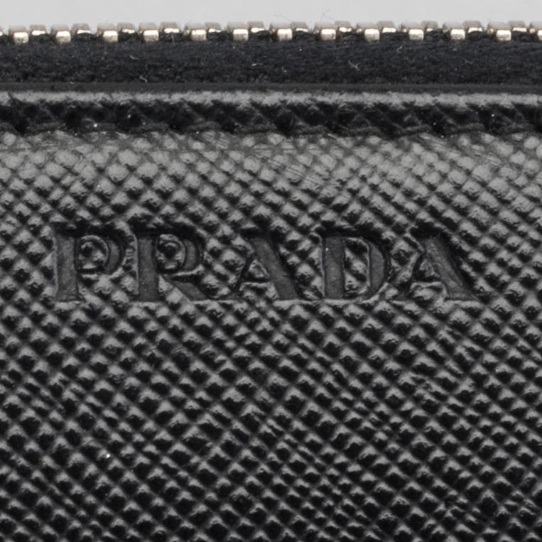 A PRADA COIN PURSE.