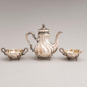 A silver sugar tong and a 3-piece silver coffee set, mark of Juho H. Pekuri, Oulu 1931 and Finnish import marks 1938.