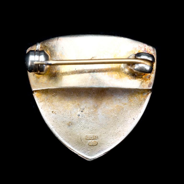 BROSCH, 18 k guld med briljantslipad diamant ca 0,10 ct. Vikt ca 2,5 g.
