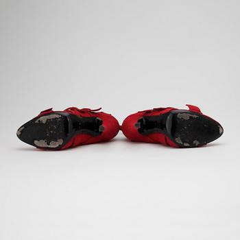 BALMAIN, DESIGN GIUSEPPE ZANOTTI, a pair of red suede boots.
