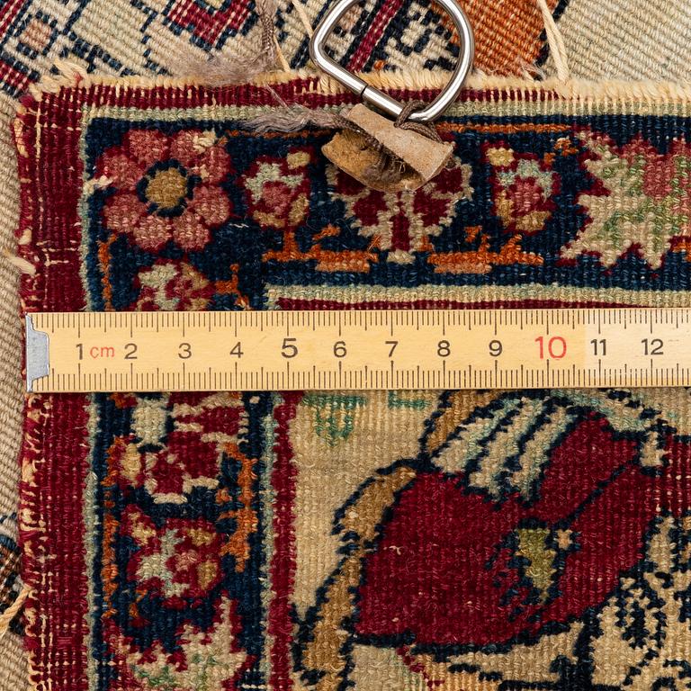 An antique Kerman Laver rug, South Persia, signed c.206 x 133 cm.