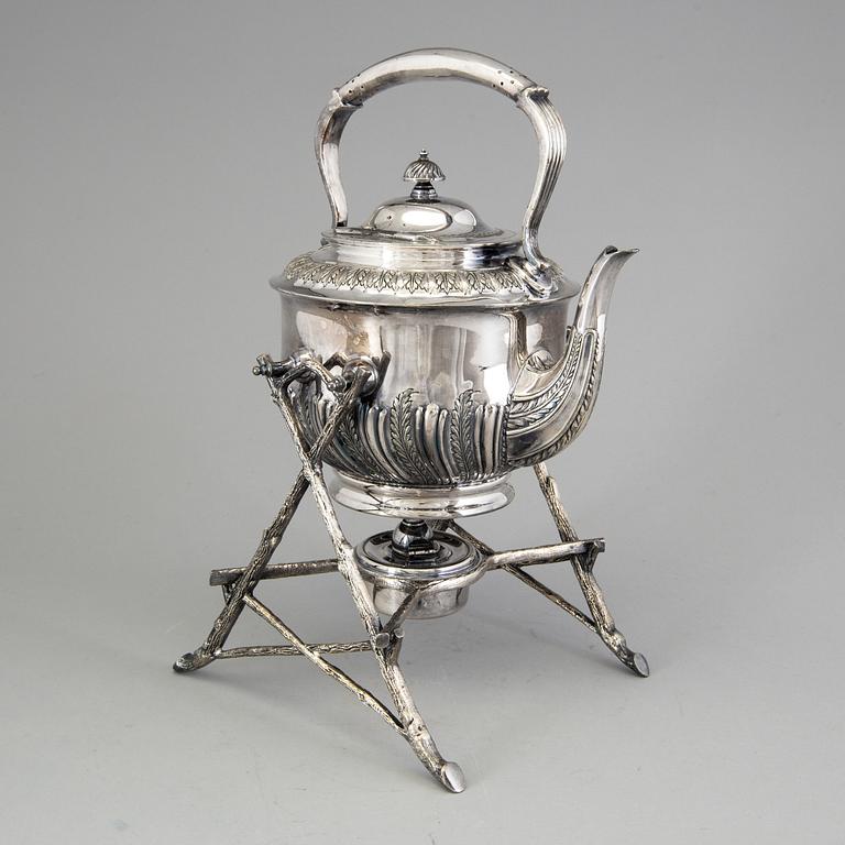 A 20th century tea pot on stand by Walker & Hall, Sheffield, England.