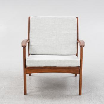 A 1950s/60s teak easy chair.