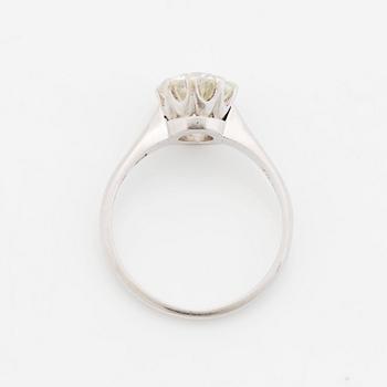 A platinum ring set with an old-cut diamond, by Wiwen Nilsson.