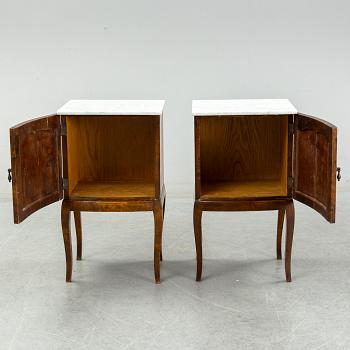 A pair of bedside tables, early 20th century.