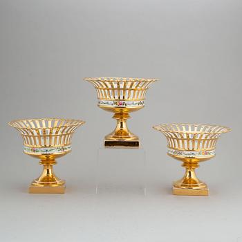 Three Rörstrand porcelain footed chestnut baskets, circa 1900.