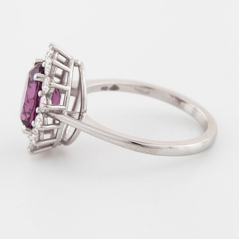 A rhodolite garnet and brilliant cut diamond ring.