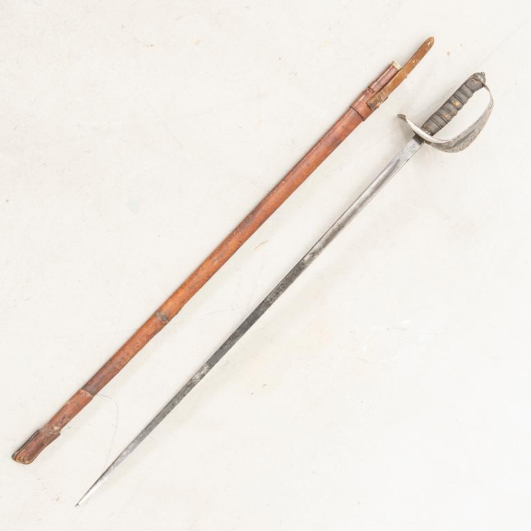 A British sabre 1897 pattern, with scabbard.