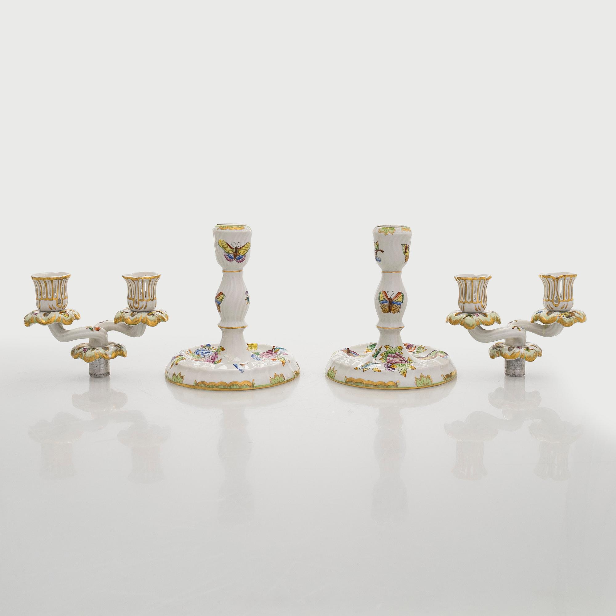 A pair of Herend porcelain candlesticks, and a lidded sugar bowl, Hungary.