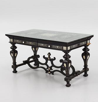 A Renaissance-style ebony, ebonized and ivory-inlaid library table, late 19th century, presumably Germany.