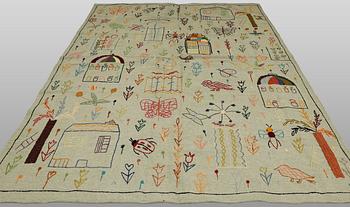 A hand-embroidered Kilim rug, approx. 241 x 183 cm.