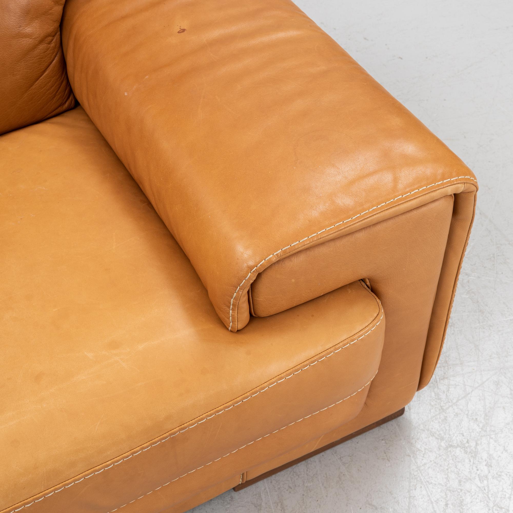 A leather upholstered sofa from Natuzzi.