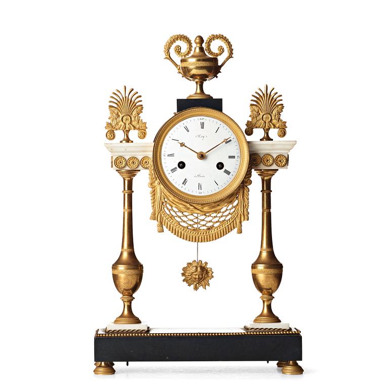 A Louis XVI circa 1790 mantel clock.