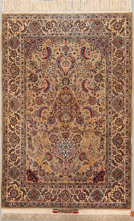A signed isfahan part silk carpet ca 192 x 118 cm.