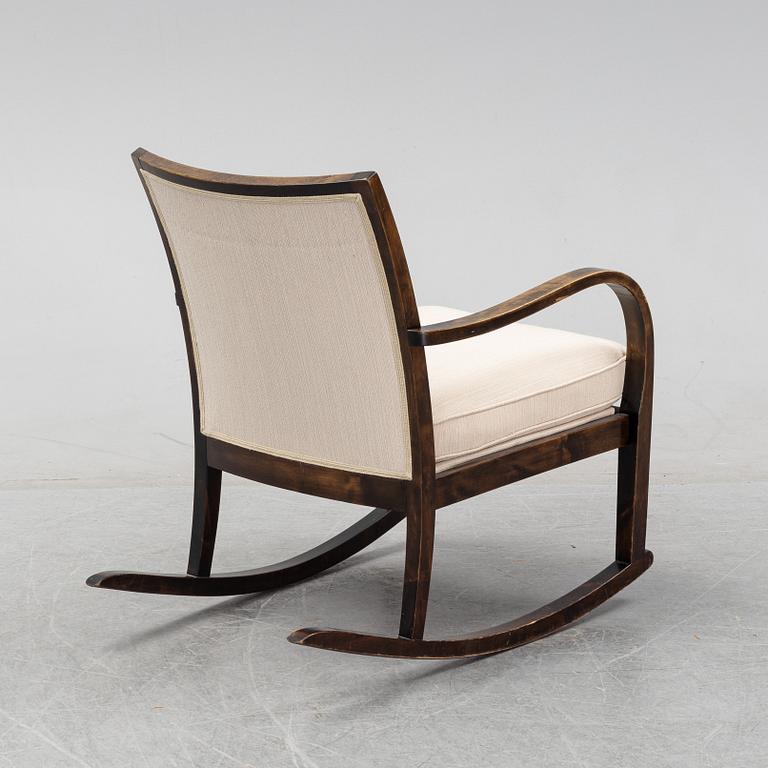 A 1930's stained birch rocking chair from Knolls Moderna Fåtöljer, 1930's.