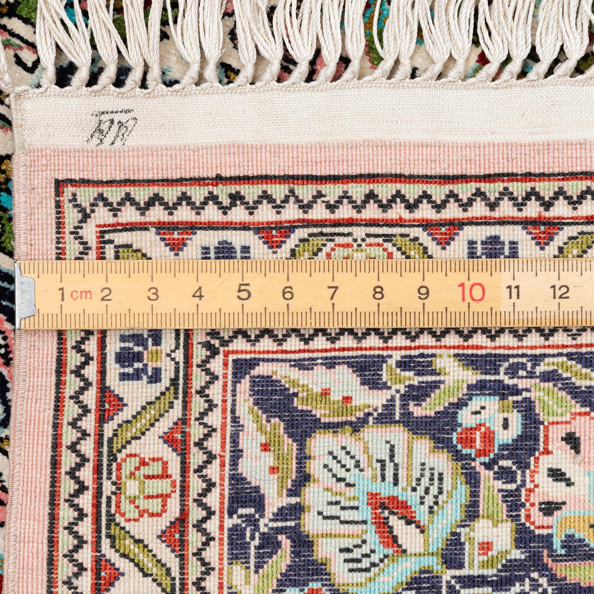 Rug, Hereke design, silk, 122 x 79 cm.