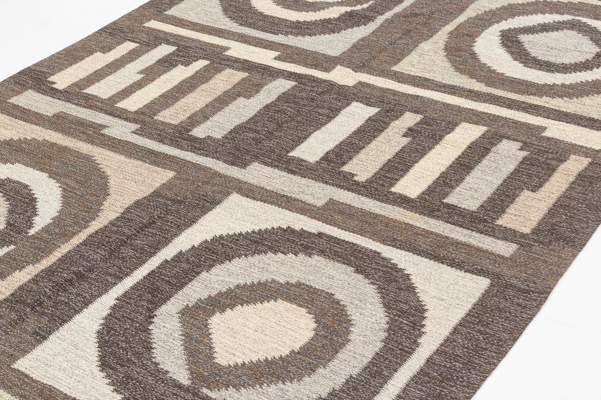 a carpet, flat weave, ca 242,5 x 170,5 cm, signed GBJ as well as a weavers signature in the form of a light blue square.