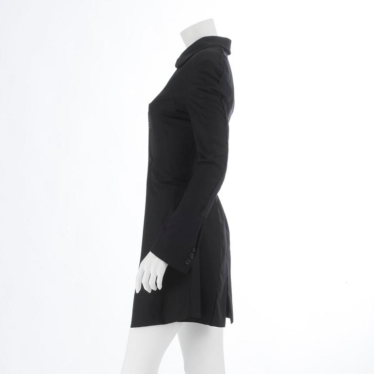 COMME DES GARÇONS, a black wool and lycra ladies suits jacket. Size m.