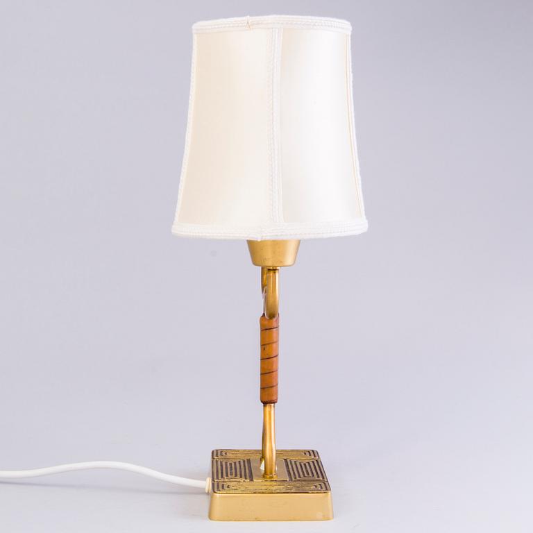 SONJA KATZIN, A 1940s brass table light from Asea, Sweden.