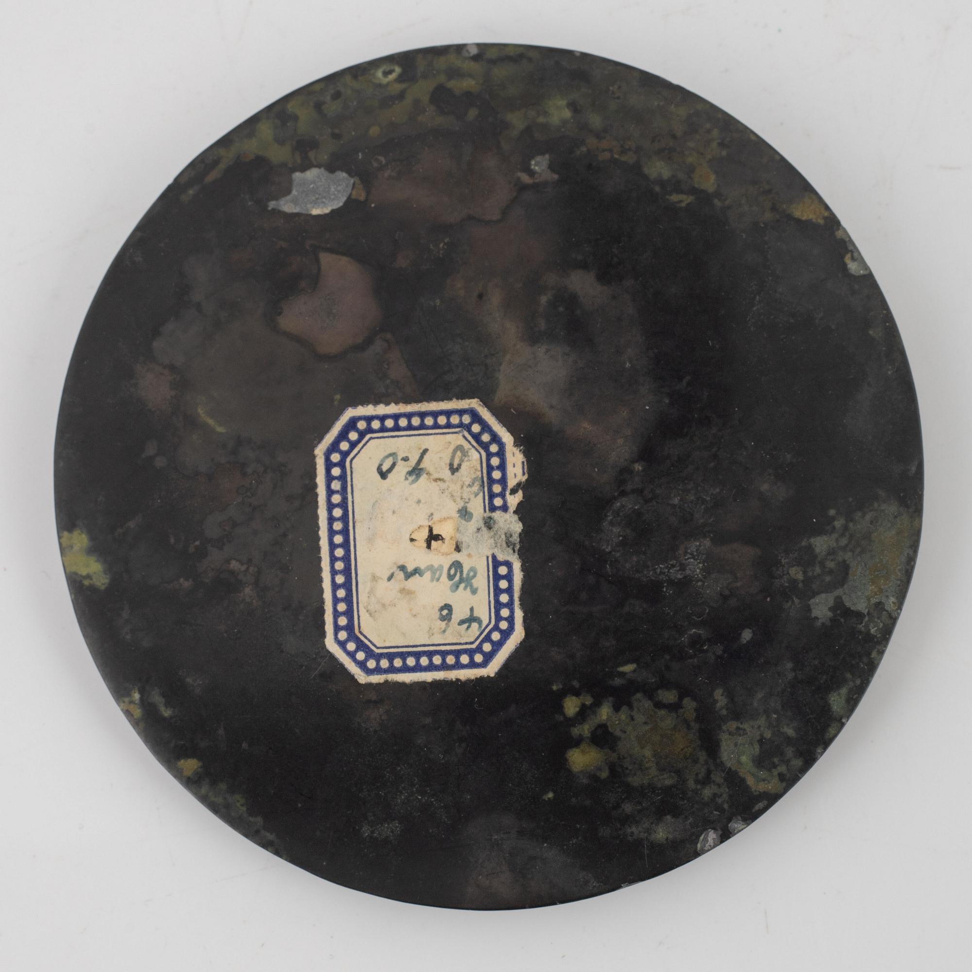 Four bronze lobed mirrors,  Han dynasty (206 B.C.-220 A.D.).