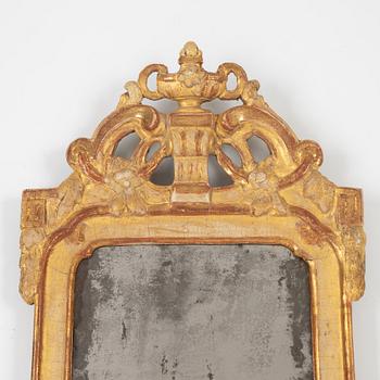 A Swedish rococo giltwood mirror, Stockholm, later part 18th century.