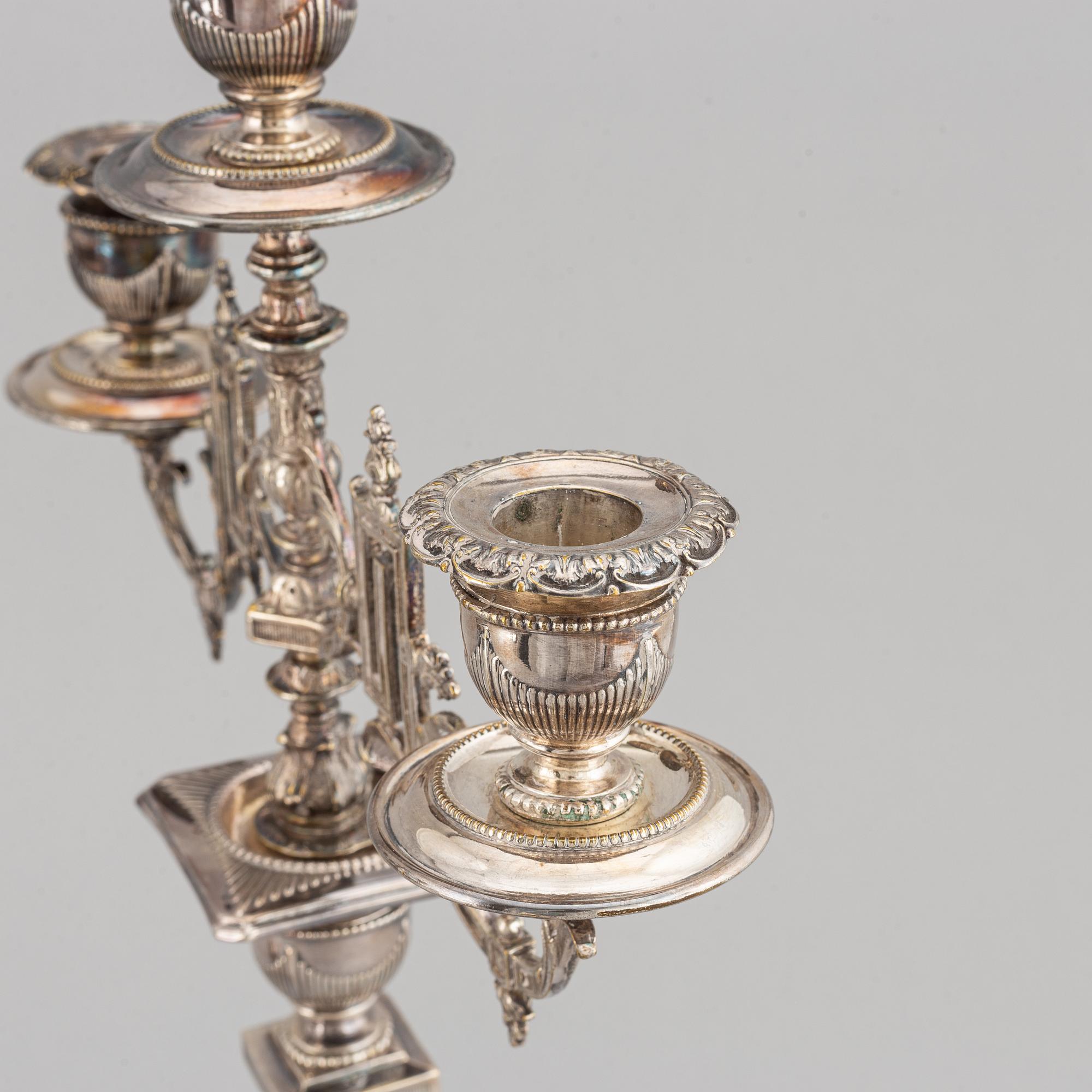 A pair of silver plated candelabras, early 20th century.