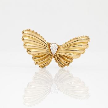 BROSCH, 18 k guld, med sten. Totalvikt ca 5 gram.