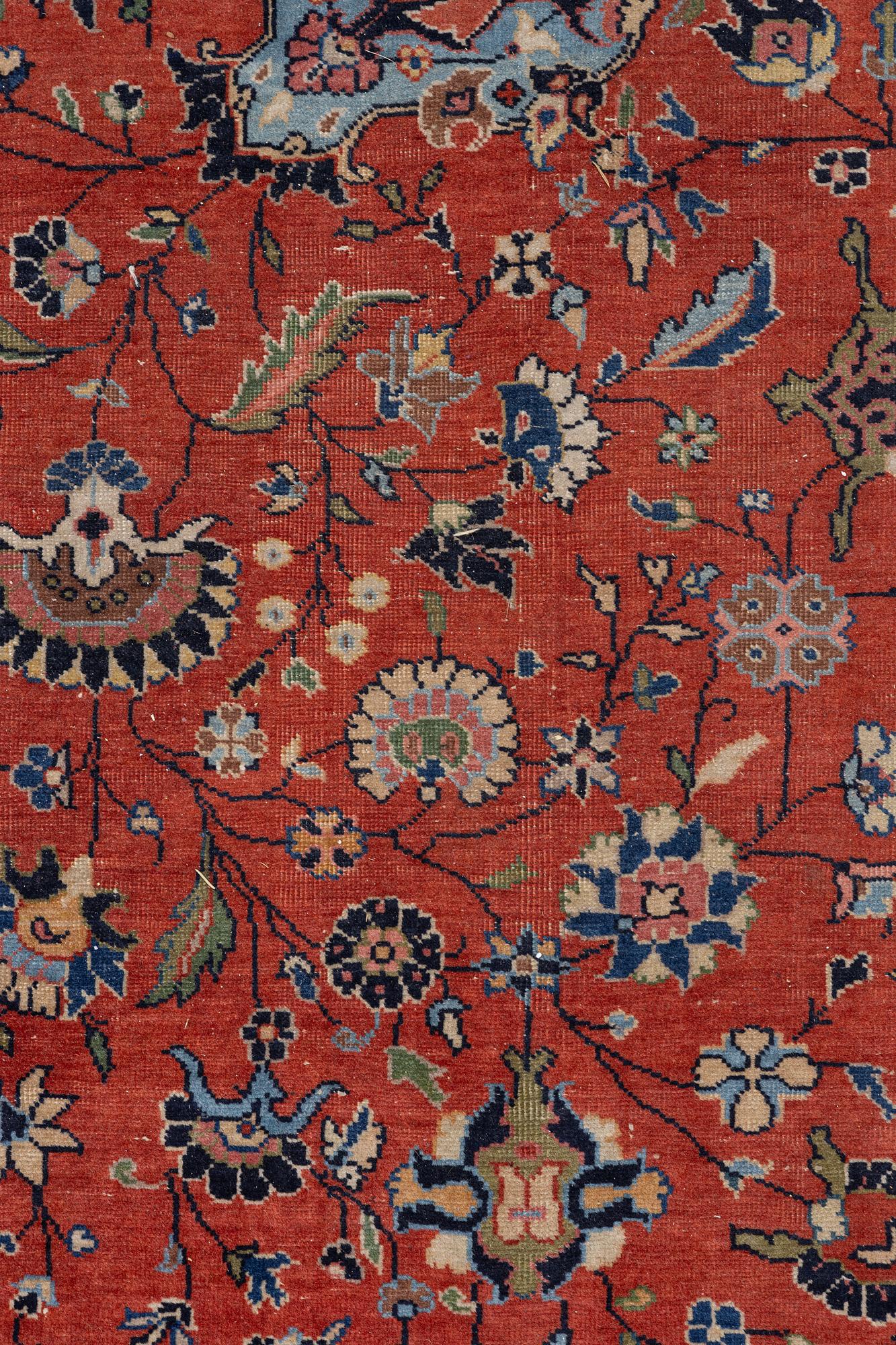 An oriental carpet, c. 370 x 275 cm.