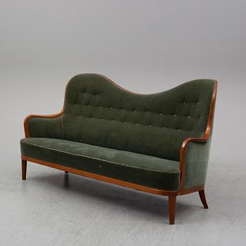 CARL MALMSTEN, an 'Advokaten' mahogany sofa.
