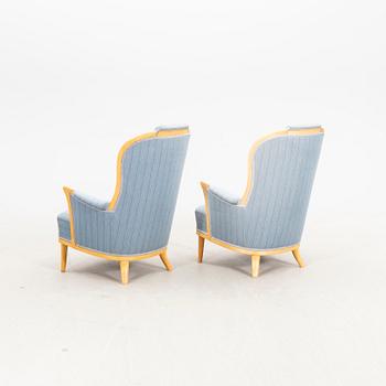 Carl Malmsten, a pair of Vår fru birch armchairs OH Sjögren alter part of the 20th century.