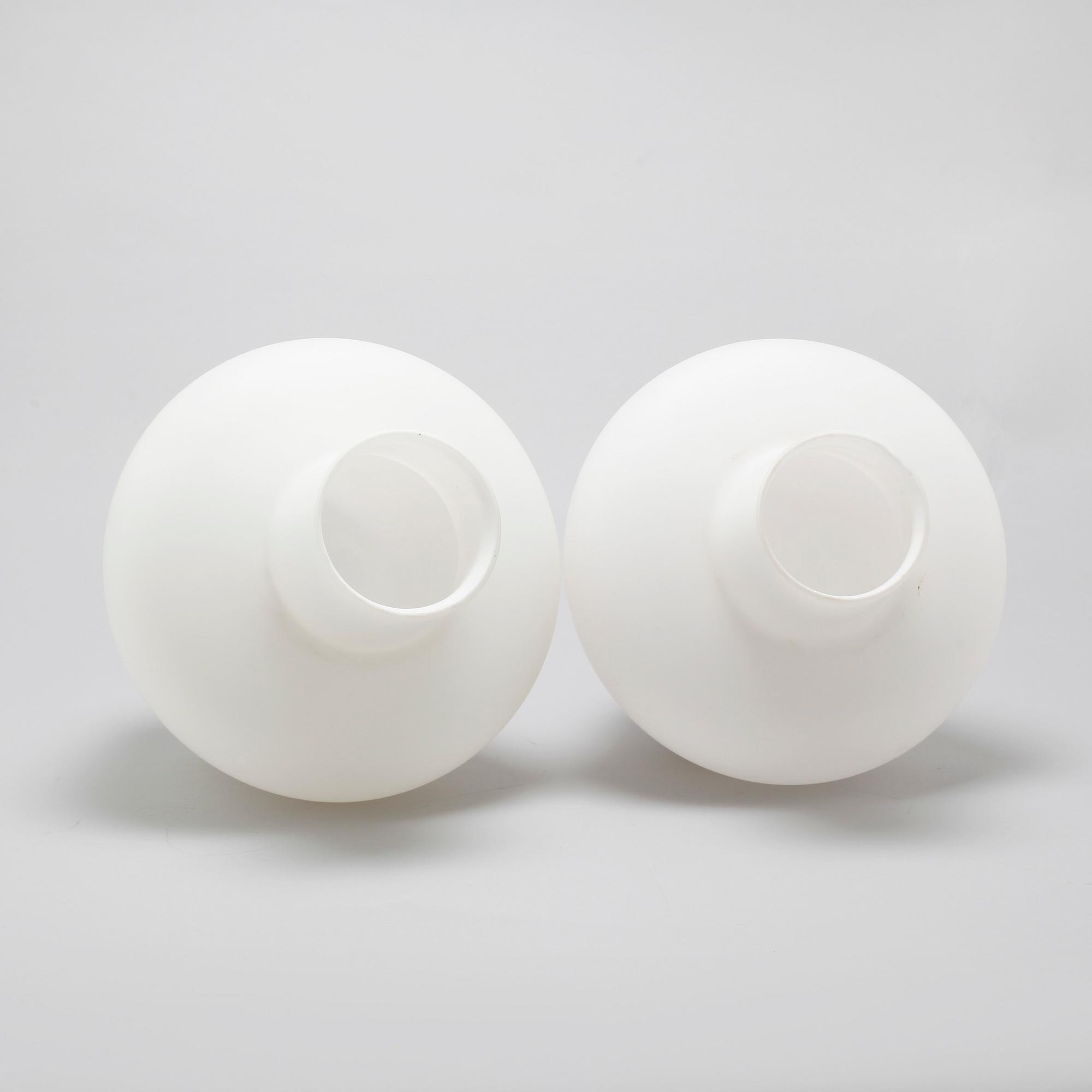 A pair of wall lamps from ASEA, around the mid 20th century.
