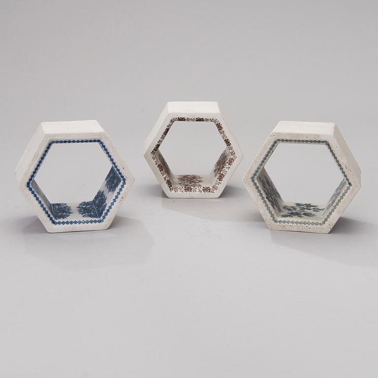 A set of three 1960s sculptures 'Hexagon tiles', for Arabia, Finland.