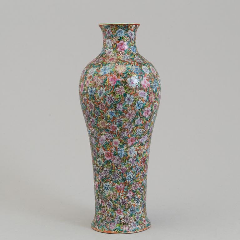 A Chinese 20th century famille rose 'mille fiore' vase, with Qianlong seal mark.