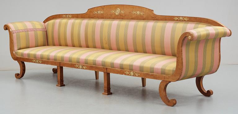 A set of Swedish Empire early 19th Century furniture comprising six armchairs, one sofa and one table.