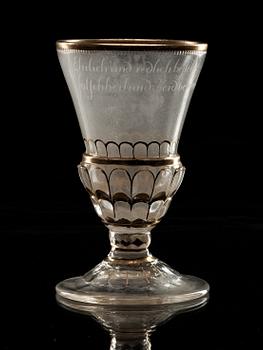 A cut, engraved and gilded armorial goblet, 18th Century.