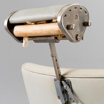 A 1950s barber chair.